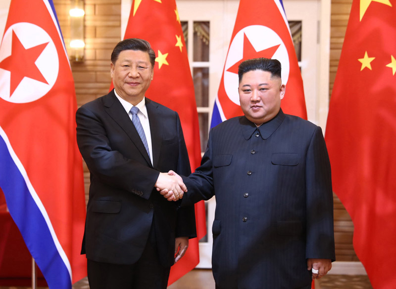 習(xí)近平同朝鮮勞動黨委員長、國務(wù)委員會委員長金正恩舉行會談